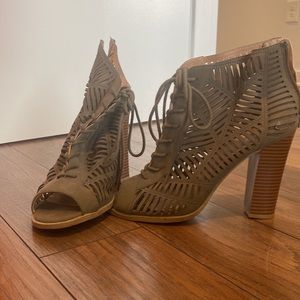 Open toe heeled booties. Olive green